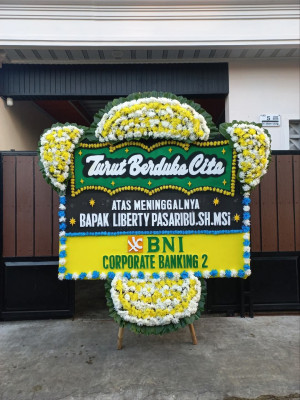 Papan Bunga Duka di Karya
