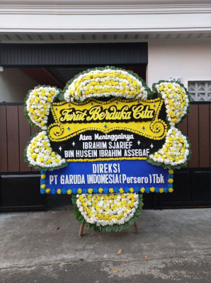 Papan Bunga Duka di Karya