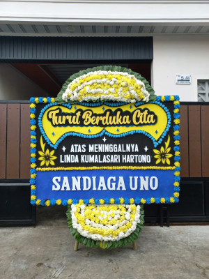 Papan Bunga Duka di Karya
