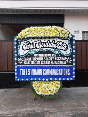 Papan Bunga Duka di Karya